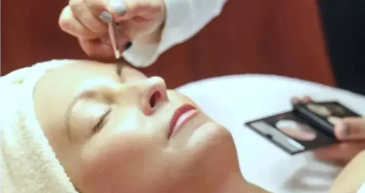 Marina Stejar mapping brow shape before permanent makeup at her Scottsdale, Arizona studio